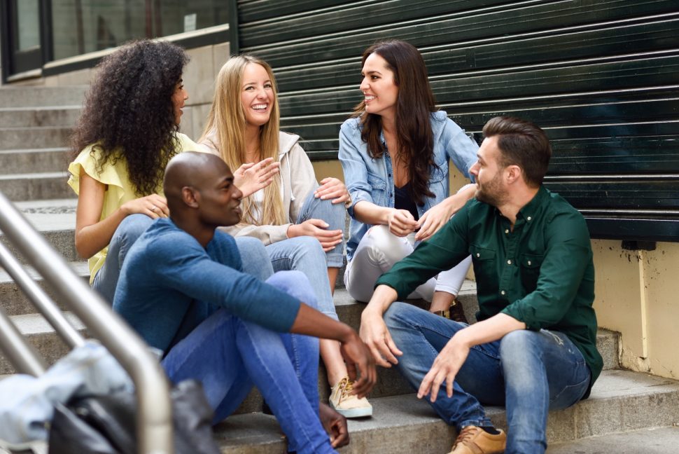 Group of friends having fun together outdoors