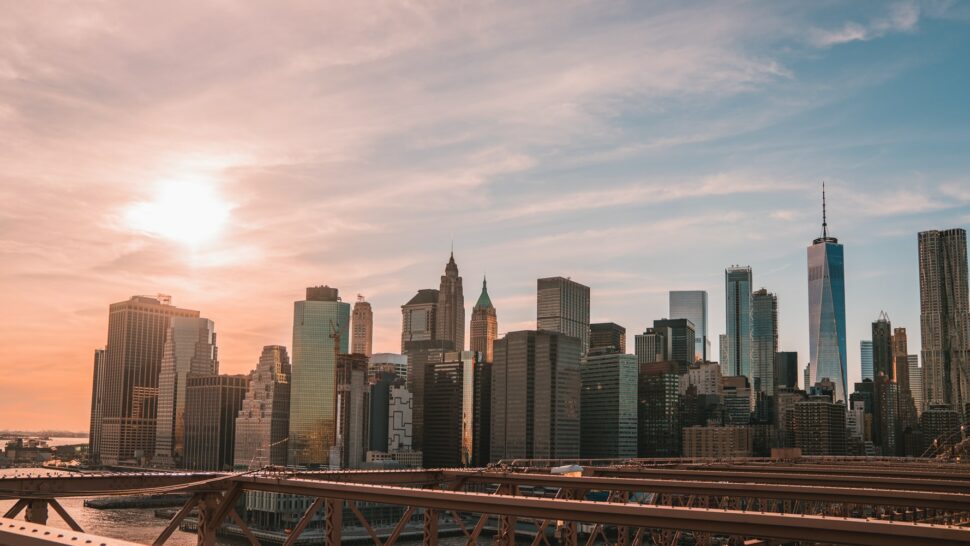 A cityscape scene featuring the New York City skyline.