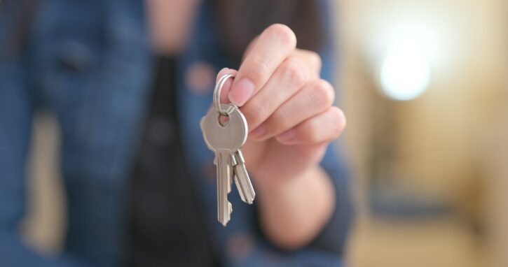 Woman holding key